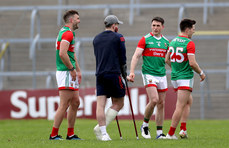 Aidan O’Shea, Paddy Durcan and Fergal Boland with Cillian O’Connor after the game 26/6/2021