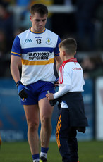 Ruairi Canavan gives a young supporter their gloves at the end of the game 10/11/2024