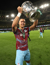 Douglas James-Taylor celebrates with the cup 10/11/2024