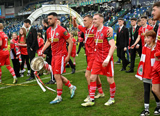 Cliftonville players celebrate winning with the the cup 4/5/2024 