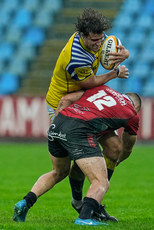 Andrea Zambonin is tackled by Marius Louw 19/10/2024