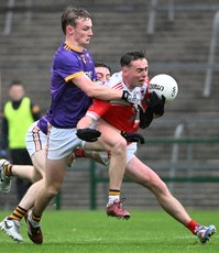 Eoin Colleran is tackled by Eoghan Carthy and Tim Lambe 20/10/2024 