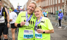 Competitors celebrate with their medals after the race 27/10/2024