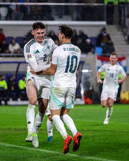 Conor Bradley celebrates with teammates after scoring a goal 18/11/2024