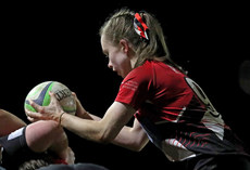 Georgia Boyce plays a ball into the scrum 16/11/2024