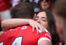 Sam Mulroy receives a hug from his partner Moya Leavy after the game 12/5/2024