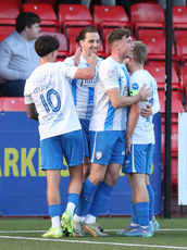 Jamie Glackin celebrates with his teammates after scoring a goal 10/11/2024