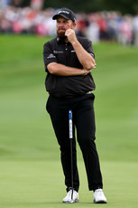 Shane Lowry stands on the 18th green 10/9/2023