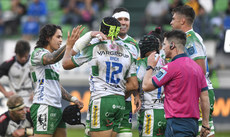 Rhyno Smith celebrates scoring a try with teammates 12/10/2024