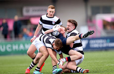 Zach Sidebottom is tackled by Fionn McMahon and Pierce O'Connor 9/2/2024