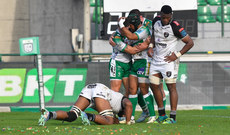 Rhyno Smith celebrates scoring a try with teammates 12/10/2024