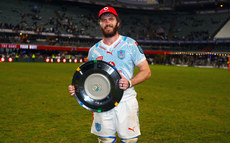 Ruan Nortje celebrates with the shield 1/6/2024