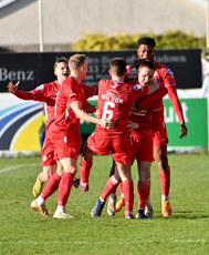 Alan OSullivan celebrates with teammates after he scores to make it 2-2 18/3/2023