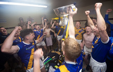 Loughrea celebrate with the cup in the dressing room 10/11/2024