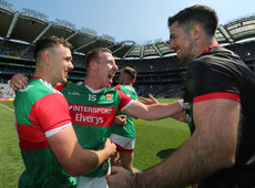 Michael Plunkett and Ryan O'Donoghue and Rory Byrne celebrate after the game 25/7/2021