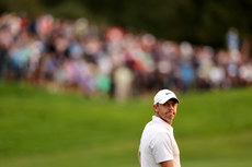Rory McIlroy stands on the 18th green 10/9/2023