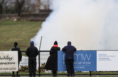 A view of a fire beside the pitch ahead of the game 11/3/2023  