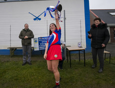 Eleanor Harrison lifts the cup 24/11/2019