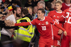 Harry Wilson celebrates scoring with fans 16/10/2018