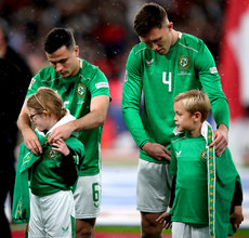 Josh Cullen and Dara O'Shea with mascots 17/11/2024