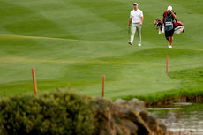 Rory McIlroy walks to the 18th green 10/9/2023