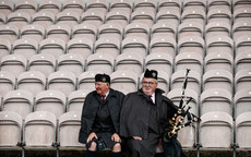 Two members of the parade band await the game 20/10/2024 