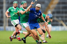 Michael Purcell is challenged by Drom and Inch's Jamie Moloney and Maidhc Fitzpatrick 17/9/2023