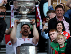 Young Mayo fans watch as Padraig Hamspey lifts the Sam Maguire 11/9/2021