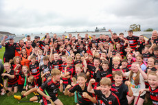 Ballygunner players, staff and supporters with the cup 10/9/2023