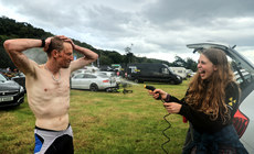 Geoff Robinson is hosed down by his daughter Faith after competing 24/7/2022