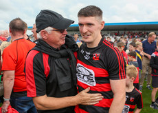 Peter Hogan with his dad Coleman at the end of the game 10/9/2023
