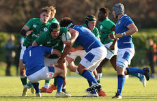 George Hadden is tackled by Samuele Taddei and Marcos Gallorini 17/12/2022