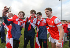 Michael Fitzsimons poses for a selfie with fans after the game 20/10/2024 