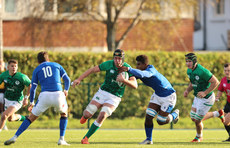 James McNabney is tackled by Giovanni Sante and Carlos Berlese 17/12/2022