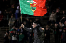 A Mayo fan runs onto the pitch during the game 28/1/2023