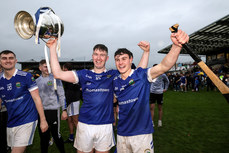 Robbie Donnelly and Colm Treacy celebrate with the trophy 27/10/2024