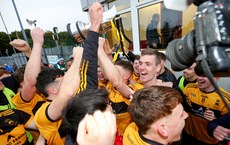 St. Eunan’s players celebrate with the Dr. Maguire Cup 13/10/2024