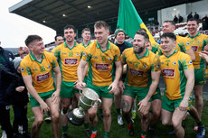 Corofin players celebrate with the cup 27/10/2024