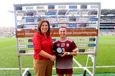 Aoife Donohue is presented with the player of the match award from Delia Reilly 7/7/2024