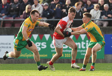 Darragh Slike and Dylan McHugh tackle Conor Harley  10/11/2024