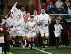 Alan O’Connor leads out his team with the match day mascots 18/10/2024