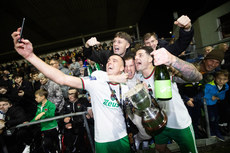 Charlie Lyons and Ruairi Keating celebrate with fans after the game 18/10/2024