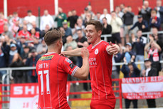 John Martin celebrates scoring his sides first goal with Matthew Smith 28/6/2024