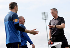 Michael Bevans and manager Liam Cahill speak to an umpire 21/5/2023 