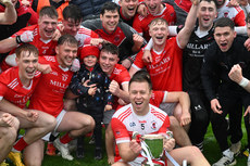 The Padraig Pearses players celebrate with the cup 20/10/2024 