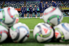 Northern Ireland players inspect the pitch 15/11/2024