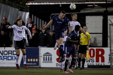 Shane McEleney competes in the air with John Mountney 18/10/2024