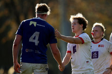 Louis McDonough shakes hands with Charlie Irvine after the game 19/10/2024