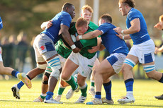 Patrick McCarthy is tackled by David Odiase and Samuele Taddei 17/12/2022