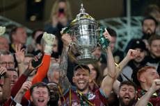 Adam Foley lifts the cup 10/11/2024